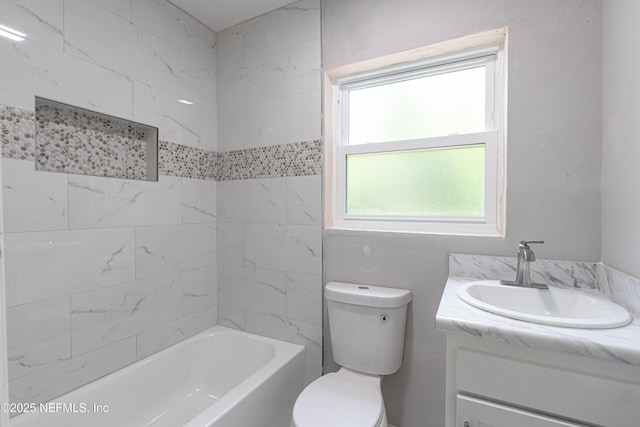 7205 Linda Dr, Jacksonville, FL 32208 - full bathroom featuring vanity, toilet, and tub / shower combination