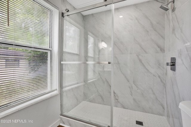 1021 Seminole Ave, Jacksonville, FL 32254 - full bath with a marble finish shower, plenty of natural light, and toilet