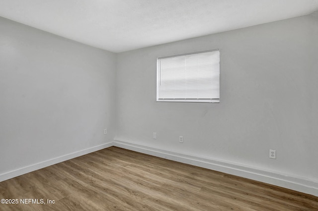 1021 Seminole Ave, Jacksonville, FL 32254 - empty room with wood finished floors and baseboards