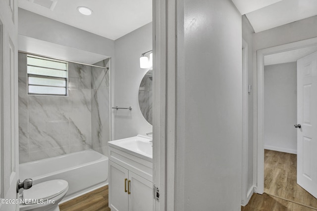 1021 Seminole Ave, Jacksonville, FL 32254 - bathroom featuring wood finished floors, vanity, shower / washtub combination, and toilet