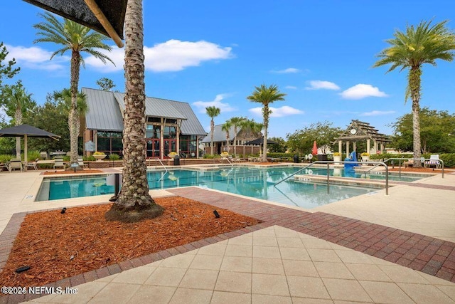 880 W American Eagle Dr, Saint Augustine, FL 32092 - community pool featuring a patio area and a pergola