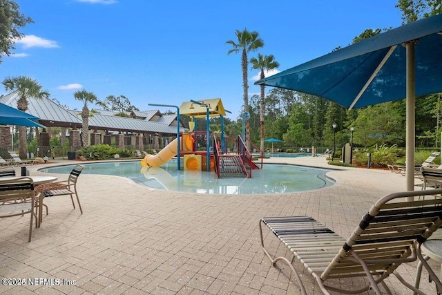 880 W American Eagle Dr, Saint Augustine, FL 32092 - community play area featuring a water play area, a community pool, and a patio