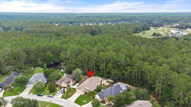 880 W American Eagle Dr, Saint Augustine, FL 32092 - aerial view of property and surrounding area with a forest, a large body of water, and nearby suburban area