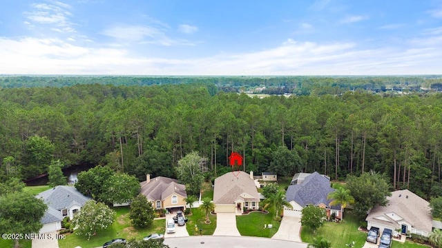 880 W American Eagle Dr, Saint Augustine, FL 32092 - aerial view of residential area featuring a forest