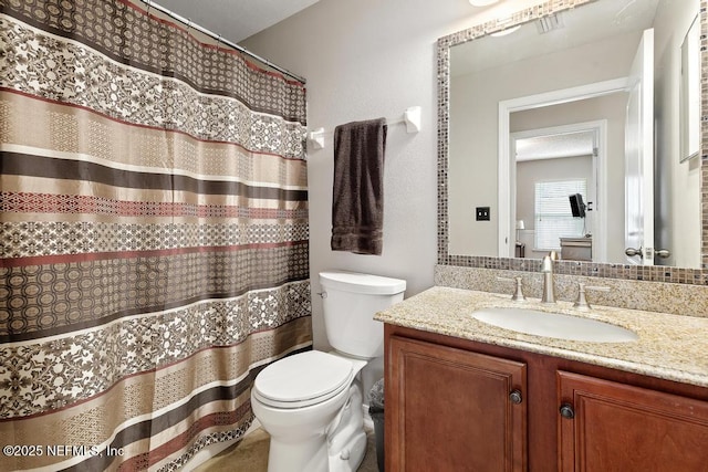 880 W American Eagle Dr, Saint Augustine, FL 32092 - bathroom featuring toilet, vanity, and a shower with shower curtain