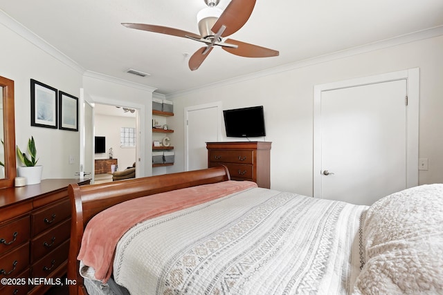 bedroom with crown molding and ceiling fan