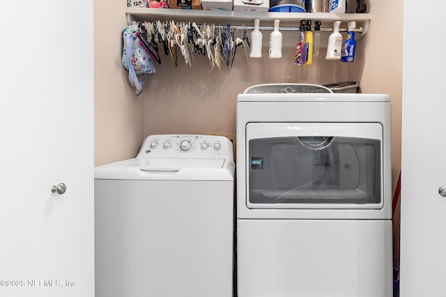 laundry area featuring washer and clothes dryer