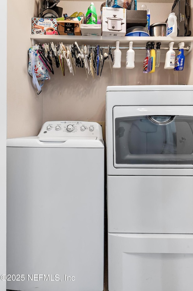 laundry area featuring independent washer and dryer