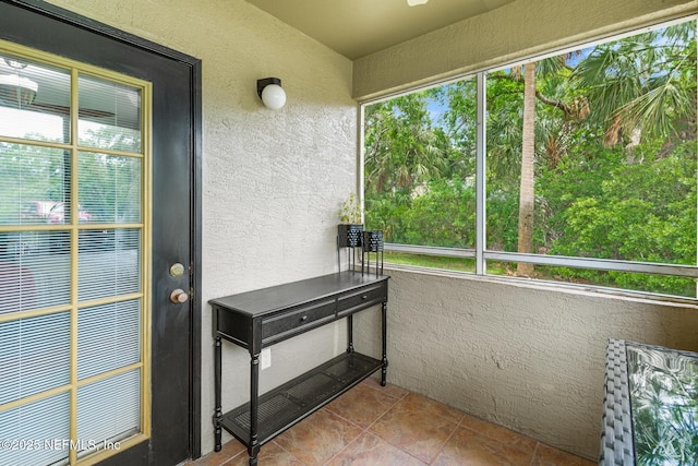 sunroom featuring healthy amount of natural light