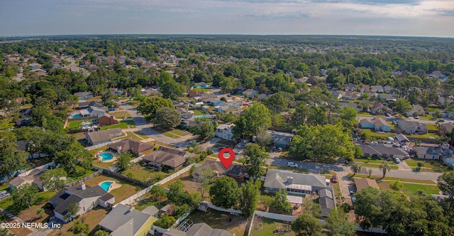 aerial view of property's location featuring nearby suburban area