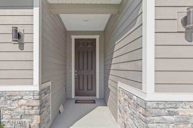 567 Flach Dr, Saint Johns, FL 32259 - property entrance featuring stone siding