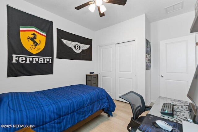 567 Flach Dr, Saint Johns, FL 32259 - bedroom featuring wood finished floors, a closet, and ceiling fan