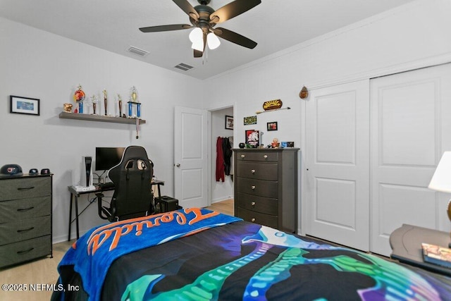 567 Flach Dr, Saint Johns, FL 32259 - bedroom featuring light wood-style floors, a closet, and a ceiling fan