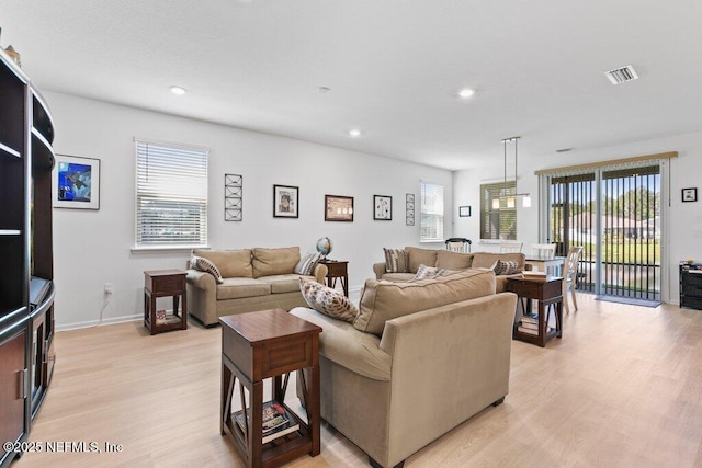 567 Flach Dr, Saint Johns, FL 32259 - living area featuring light wood finished floors, recessed lighting, and baseboards