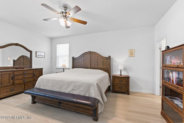567 Flach Dr, Saint Johns, FL 32259 - bedroom with light wood-type flooring, baseboards, and a ceiling fan