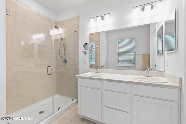 567 Flach Dr, Saint Johns, FL 32259 - full bath featuring a stall shower, double vanity, and tile patterned flooring