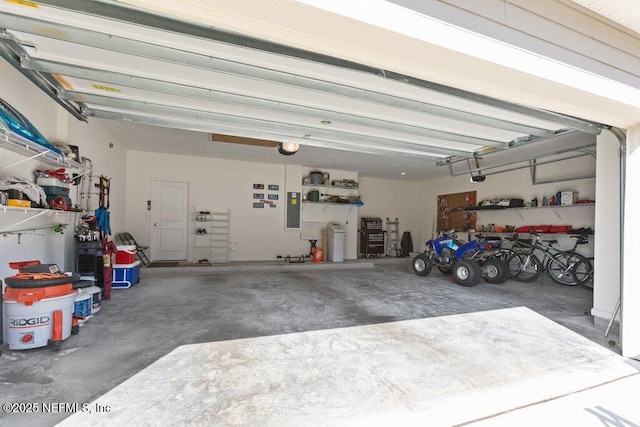 567 Flach Dr, Saint Johns, FL 32259 - garage with electric panel and a garage door opener