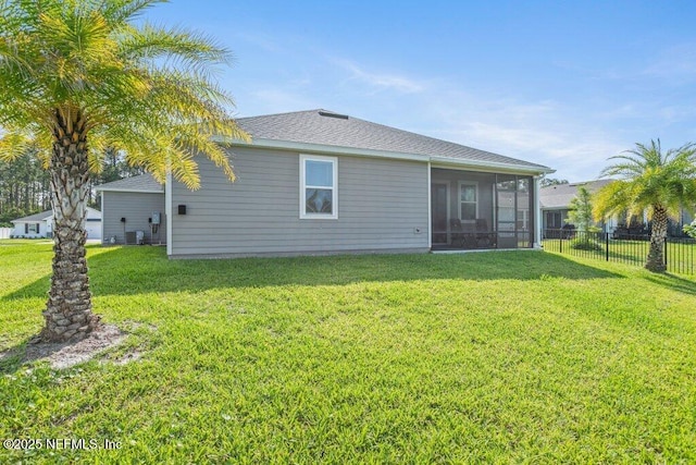 567 Flach Dr, Saint Johns, FL 32259 - rear view of property featuring a sunroom, a shingled roof, and central AC unit