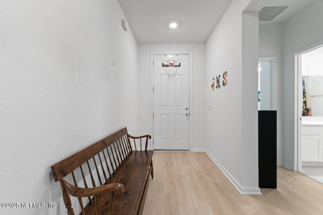 567 Flach Dr, Saint Johns, FL 32259 - hallway with light wood-type flooring and baseboards