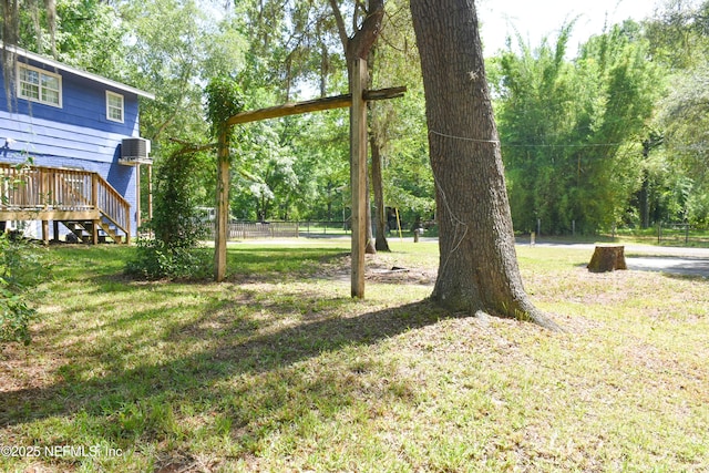 2873 Creek St, Middleburg, FL 32068 - view of yard featuring a wooden deck and view of wooded area