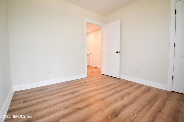 2873 Creek St, Middleburg, FL 32068 - unfurnished bedroom with light wood-style floors and baseboards