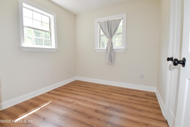 2873 Creek St, Middleburg, FL 32068 - spare room featuring healthy amount of natural light, light wood-style flooring, and baseboards