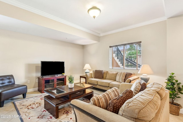living room featuring crown molding, light tile patterned floors, and baseboards