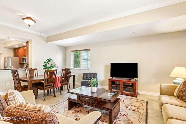 living area featuring light tile patterned floors, ornamental molding, and baseboards