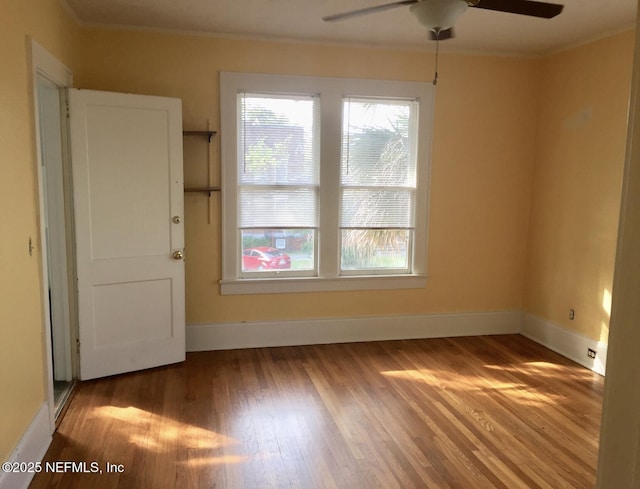 2523 Forbes St, Jacksonville, FL 32204 - unfurnished room featuring a ceiling fan, wood finished floors, baseboards, and ornamental molding