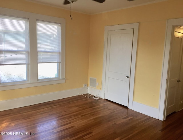 2523 Forbes St, Jacksonville, FL 32204 - unfurnished room with dark wood-style flooring, ceiling fan, baseboards, and ornamental molding