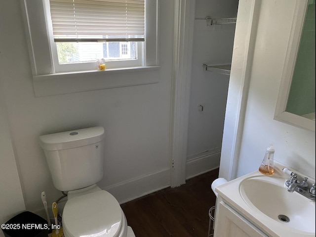 2523 Forbes St, Jacksonville, FL 32204 - bathroom featuring toilet, wood finished floors, and vanity