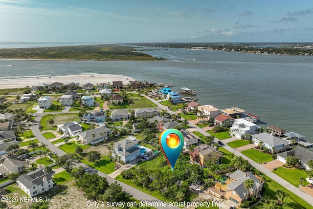 203 Sea Turtle Way, Saint Augustine, FL 32084 - aerial view of property and surrounding area featuring a large body of water and nearby suburban area