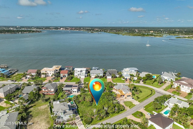 203 Sea Turtle Way, Saint Augustine, FL 32084 - aerial view of property and surrounding area with nearby suburban area and a large body of water