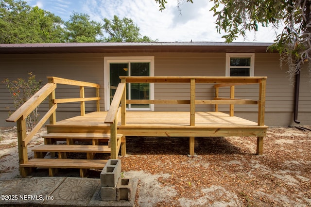 7013 Elfo Rd, Keystone Heights, FL 32656 - rear view of house featuring a deck