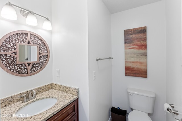 7013 Elfo Rd, Keystone Heights, FL 32656 - half bath featuring toilet and vanity