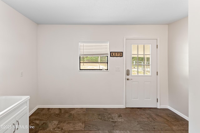 7013 Elfo Rd, Keystone Heights, FL 32656 - doorway with baseboards