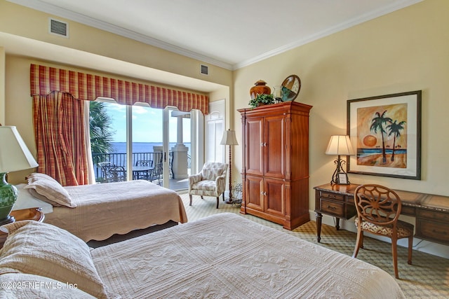 2358 Riverside Ave Unit 304, Jacksonville, FL 32204 - bedroom with access to exterior, crown molding, and baseboards