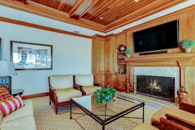 2358 Riverside Ave Unit 304, Jacksonville, FL 32204 - living area featuring wood ceiling, crown molding, built in features, baseboards, and a high end fireplace