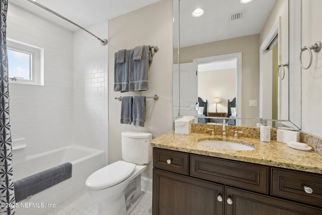 2358 Riverside Ave Unit 304, Jacksonville, FL 32204 - bathroom with toilet, vanity, shower / bath combo with shower curtain, and recessed lighting