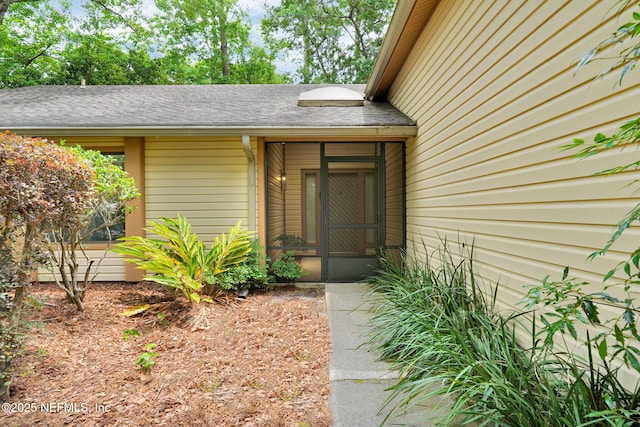 11711 Sparkleberry Ln, Jacksonville, FL 32223 - entrance to property with a shingled roof