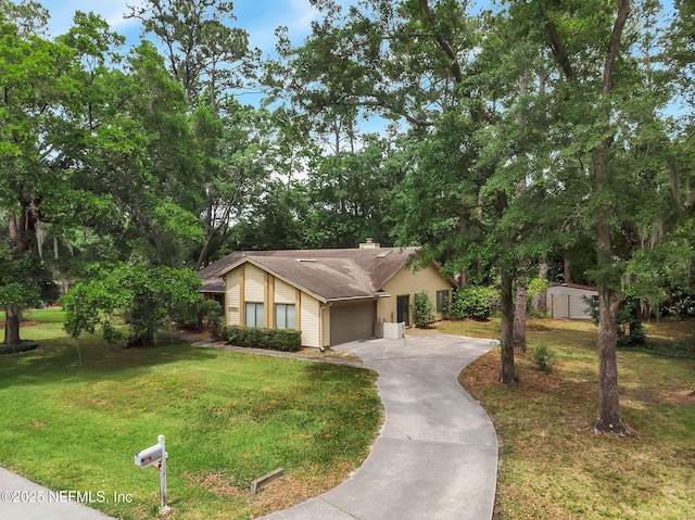 11711 Sparkleberry Ln, Jacksonville, FL 32223 - view of front of home featuring driveway, a front lawn, a garage, and a chimney