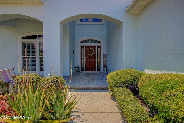 9155 June Ln, Saint Augustine Beach, FL 32080 - entrance to property with stucco siding