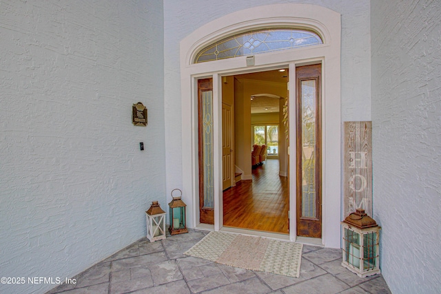 9155 June Ln, Saint Augustine Beach, FL 32080 - doorway to property featuring stucco siding