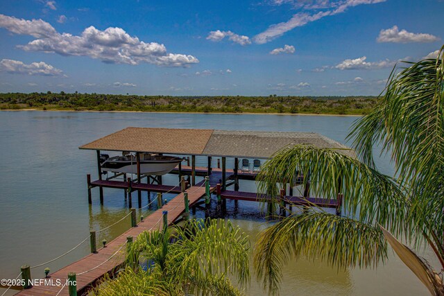 9155 June Ln, Saint Augustine Beach, FL 32080 - dock area featuring boat lift and a water view