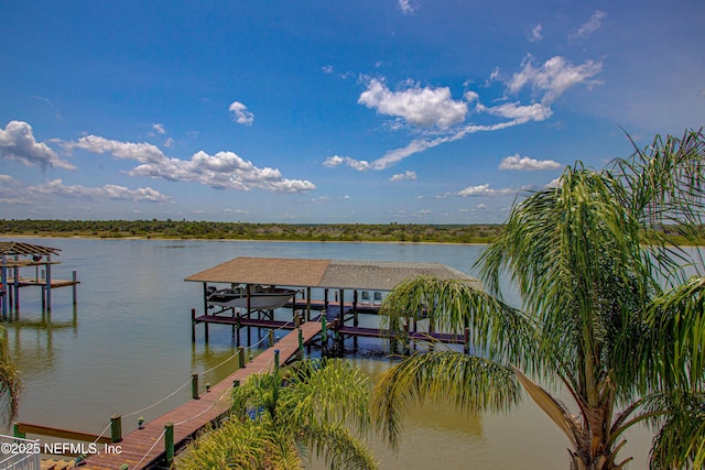 9155 June Ln, Saint Augustine Beach, FL 32080 - dock featuring boat lift and a water view