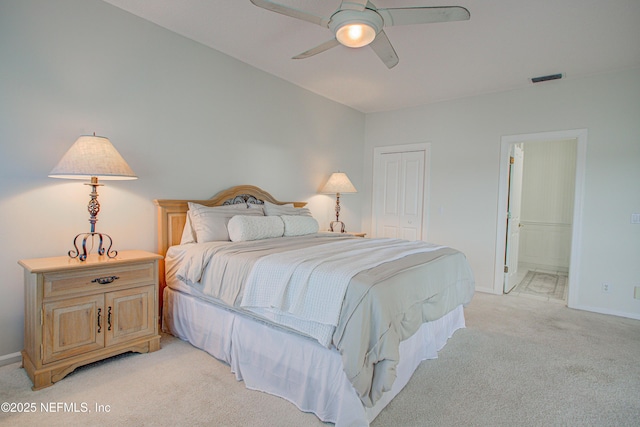 9155 June Ln, Saint Augustine Beach, FL 32080 - bedroom with light colored carpet, baseboards, ensuite bathroom, and a closet