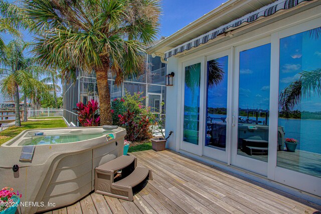 9155 June Ln, Saint Augustine Beach, FL 32080 - deck with a hot tub and fence