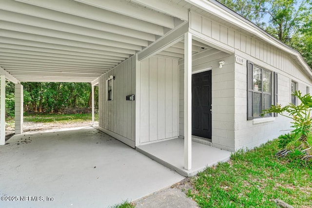 view of outdoor structure with an attached carport
