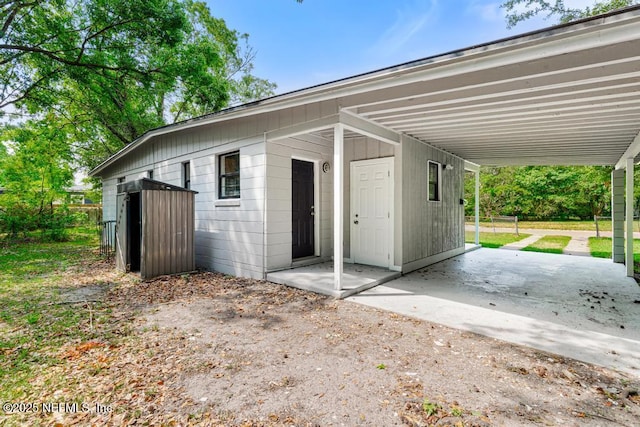 view of outdoor structure with a carport