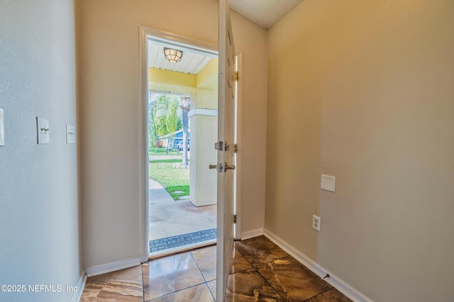 1413 Heather Ct, Saint Augustine, FL 32092 - doorway to outside with baseboards